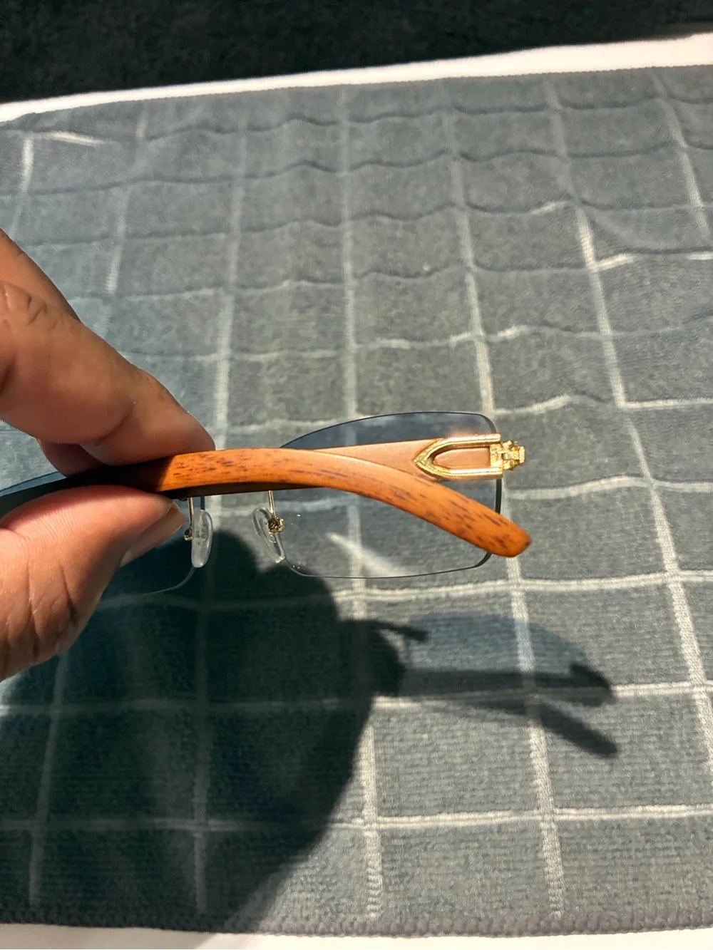 Rimless Blue Lens Sunglasses with Wood Arms and Gold Bridge